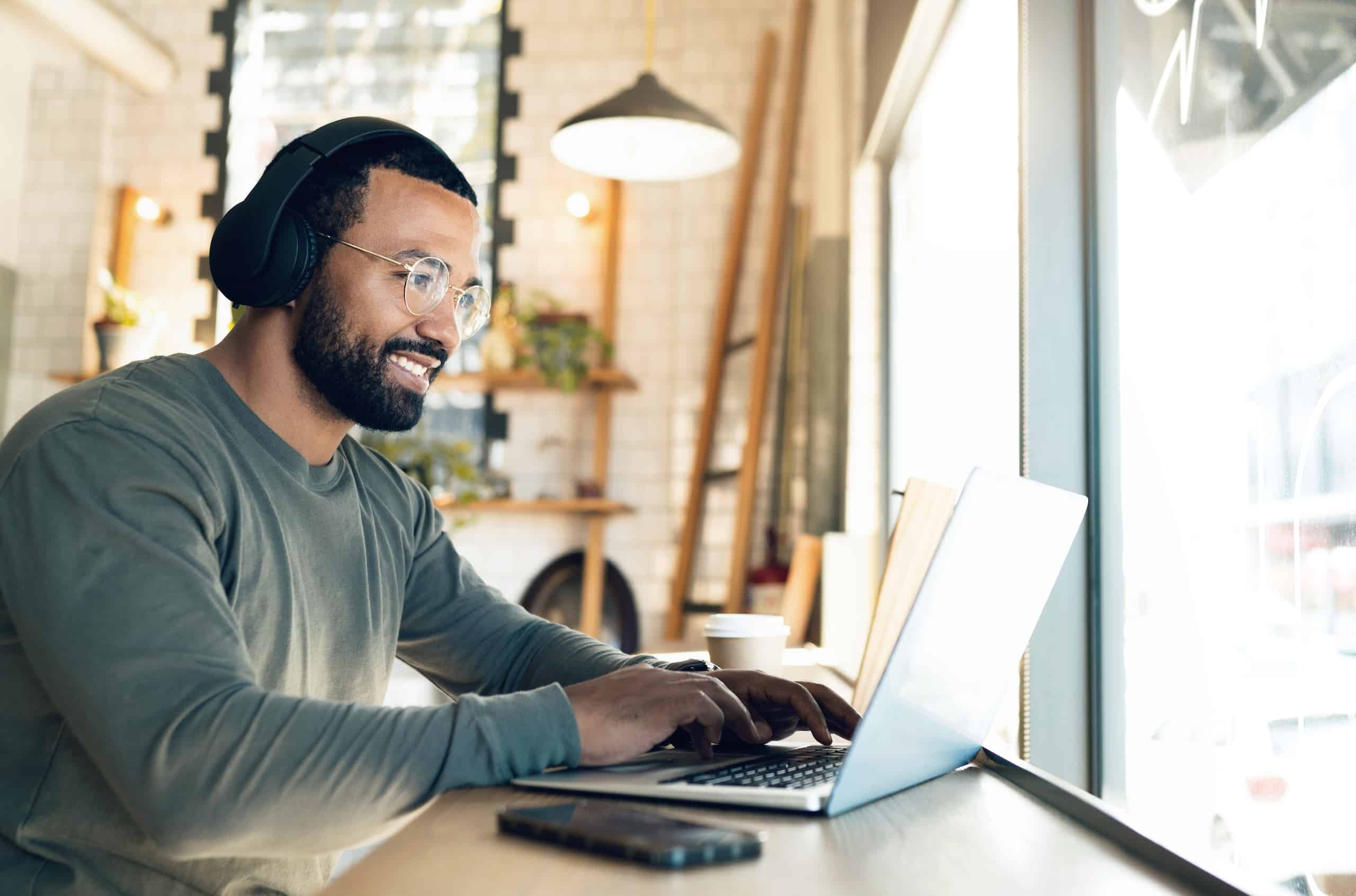 Man working remotely from the cloud
